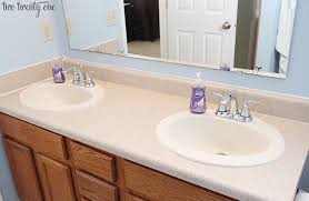 This is a page about cloudy white spots on laminate countertop. New Bathroom Countertops