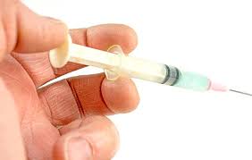 Hypodermic Needle Closeup And Hand Held Stock Photo ...