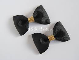 Elegant and charming, this gorgeous hair barrette features a symmetrical filigree pattern reminiscent of the classic 1920s style. Black And Gold Hair Bows Set Of Bows Hair Clips Holiday Etsy Gold Hair Bow Holiday Hair Bows Glitter Hair Bows