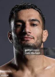 Justin Ledet celebrates his submisison victory over Mark Godbeer in... News  Photo