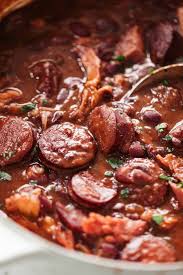 A Pot Of Red Beans And Rice Cooking On The Stove Red Beans Rice In 2020 Red Beans Cafe Delites Cooking Recipes