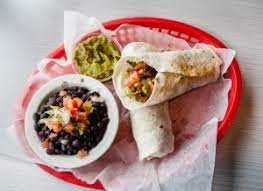 Crispy fried baja fish tacos with crunchy cabbage, fresh pico de gallo, and creamy white sauce all finished with tangy lime! East Memphis Soul Fish Cafe Southern Soul Food Restaurant