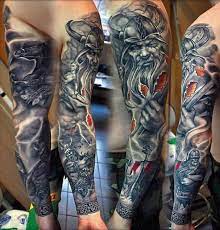 Armband tattoos are sited on the upper arm, wrapping right around the bicep in a continuous band. Top 121 Cool Upper Arm Tattoo Ideas In 2021