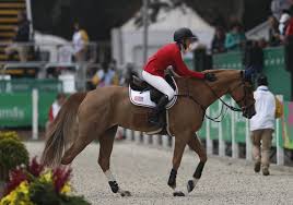 Eve Jobs Of The U S Pats Her Horse Venue D Fees Des Hazalles As She Exits The Ring After Competing In The Fir Equestrian Equestrian Outfits Equestrian Jumping