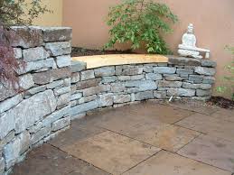 Stacked Stone Wall W In Laid Wood Bench Random Geometric Hardscape Dry Stone Stone Walls Garden Stone Bench