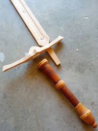 Wooden Sword Interesting Way Of Attaching The Guard And Handle To The Blade Wood Sword Woodworking Wood Crafts