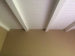 Install false beams and sink the lights in them. Need Advice Track Lighting On Side Of Beam Or Ceiling