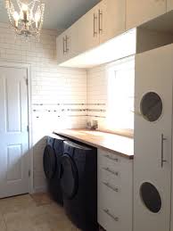 Laundry Room With Ikea Akumum Cabinets And Applad Doors The Cabinet With The Holes Is I Laundry Room Closet Small Apartment Closet Bedroom Organization Closet