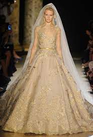 A High Fashion Gold Wedding Dress From Elie Saab Gold Wedding Dress Gold Wedding Gowns Fantasy Wedding Dresses