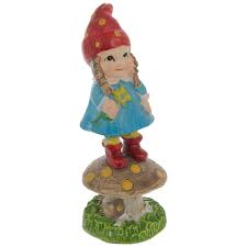 Constructed of resin, this adorable fairy house offers cute house shape with glittery green leaves and a butterfly on top with flowers and mushrooms at the base. Gnome Girl On Mushroom Hobby Lobby 1176197