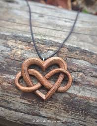 Glue the design on one of the wooden discs. Infinite Love Pendant Celtic Heart Necklace Wooden Pendant Etsy Wood Necklace Pendant Wood Jewelery Wood Necklace