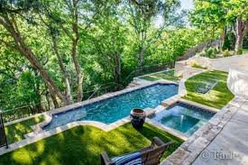 Fort Worth Extreme Hillside Pool With Spa Cabana Outdoor Kitchen Designed By Mike Farley Of Farle Hillside Pool Backyard Pool Designs Outdoor Kitchen Design
