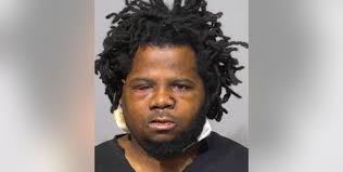 8 years in prison for man who had stolen gun, machete, hatchet, ammunition;  shot by UWM police