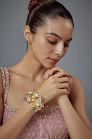 Buy Gold Plated Polki, Kundan Florence Bloom Swirl Bracelet by Vivinia By  Vidhi Mehra Online at Aza Fashions.