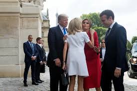 Macron and his wife brigitte stand with trump and first lady melania trump during a welcoming ceremony at les invalides in paris. State Party Takes Aim At Hijabs For Children Also Australian Is Shot In U S And Julie Bishop On Trump The New York Times