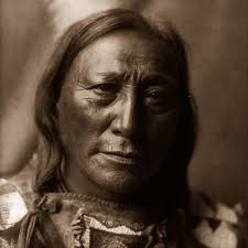 Should Native American men be allowed to wear their hair long at school?