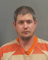 Suspect charged in road rage attack