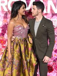 Priyanka Chopra Jokes That She Had 32 Weddings As Nick Jonas Dubs Her A Snack Vivienne Westwood Dress Cute Celebrity Couples Priyanka Chopra