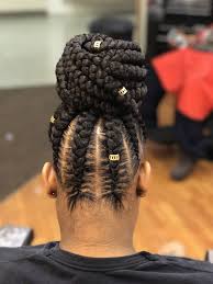 If you have medium or long hair, you can try out many creative braided bun hairstyles to enhance your personality. African Hair Braiding Feed In Braids Bun Braidedhairstyles Feedinbraids Braidsandtwists Updo Beauty Haircut Home Of Hairstyle Ideas Inspiration Hair Colours Haircuts Trends