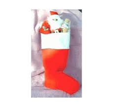 This stocking stuffer can be filled with anything from an herb plant to seasonings for the next bbq. Candy And Toy Filled Christmas Stocking