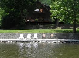 The open layout and wraparound porches make this small home live large. Townsend Cabin Rental Fishin Hole Cabin Overlooking The Little River In Townsend Tn Family Owned