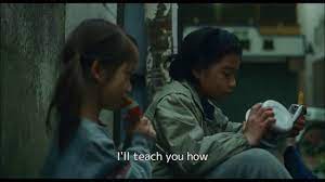 Already, their lives are starting to change—one friend is going into the military because his parents told him to, a couple in the group starts to sense breakup tension in their relationship, another is stuck at the same job she had when they first all met. Shoplifters Film Film Movies Cinematography