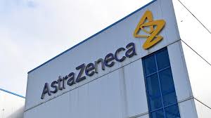 Astrazeneca oxford vaccine logo on blue background, covid19 vaccine vial and syringe, coronavirus immunization: Astrazeneca Vaccine Should Combat Covid 19 Variant Al Arabiya English