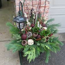 Realize the best winter garden planters have a combination of living plants and natural materials last, katherine at 'your place by design' made her winter planters with some really cool seed pods. Ideas For Outdoor Christmas Pots Hgtv