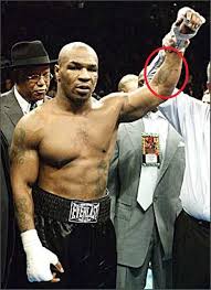 Mike tyson is an american former professional boxer who holds the record for the youngest boxer to win the wbc (world boxing council), wba (world boxing association), and ibf (international boxing federation) heavyweight titles. Mike Tyson S 6 Tattoos Their Meanings Body Art Guru