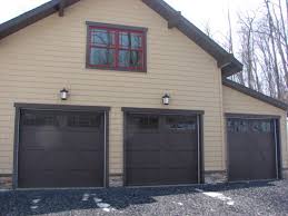 The most commonly installed doors are manually operated and are either an overhead sectional door or a roller door. Clopay Coachman Door Rustic Garage Other By Central Pa Dock And Door