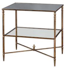 This lovely furniture has antique glass doors that are complemented with graceful millwork. Nicolina Antique Gold Tiered Glass Accent Table
