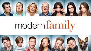 Download The Modern Family Cast on the DVD Cover of their Hit Sitcom  Wallpaper | Wallpapers.com