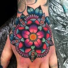 Is It A Mandala Is It A Sailor Jerry Flower Mandala Flower Tattoos Tattoos Hand Tattoos