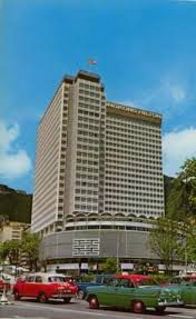 photos of hilton hotel 1963 1995 gwulo old hong kong 香港 此相片拍攝於1965年 距今53年前 位置是港島中環 皇后大道中及花園道口 也就是現今的長江集團中心 hotel exterior hilton hotel hong kong island