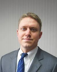 First National Bank of Suffield promotes four