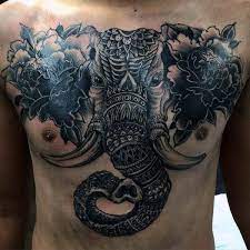 80 Stunning Elephant Tattoos To Choose From Gravetics Elephant Tattoos Elephant Tattoo Design Tattoos For Guys