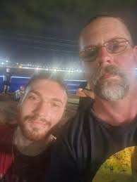 Offering free dad hugs