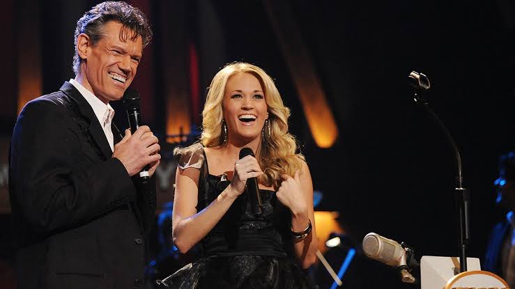 Carrie Underwood's tribute to Randy Travis moves Grand Ole Opry audience to  tears