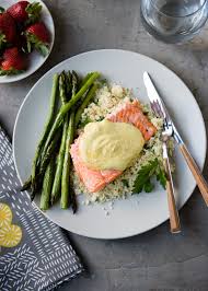 Immediately place the salmon into the skillet, skin side down. Salmon Sheet Pan Dinner With Curried Yogurt Sauce