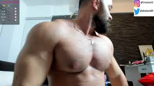 flexing my big muscles and jerk my hard cock