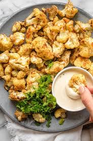 Oven Roasted Cauliflower With Tahini Recipe Roasted Cauliflower Recipes Oven Roasted Cauliflower Veggie Dishes