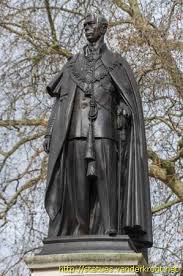 The statue stands on a base of portland stone. London King George Vi