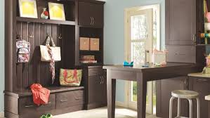 The paneled subzero refrigerator, miele dishwasher, wolf warming drawer and subzero beverage center from bekins keep the look streamlined. Stock Kitchen Cabinets At Lowes Com