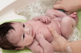 Bathing your baby too much can dry out his or her skin. Mom And Baby Co Bathing With Infant Baby Bath Moments