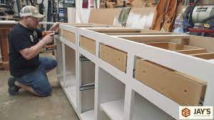 For one person building mdf boxes especially in long runs the way i do the weight of the mdf works against itself and will kill your babies. Office Remodel Diy Budget Cabinets Jays Custom Creations