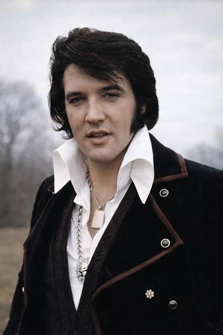 On August 1, 1969, inside a crowded room at the International Hotel in Las  Vegas, Elvis Presley sat before reporters for the first time in years.  Flashbulbs popped, voices buzzed, and yet