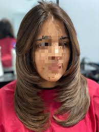 Advance layers cutting done by Mona Depilex (pakistan)qualified hair  dresser n beautician with 15 years experience.we do all type of hair  cutting blowdry coloring,highlights,keratin ,permanent straightening.hair  styling Bridal n party makeups Facials ,