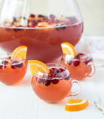 All the festive fruits come together in this giant punch bowl cocktail. Christmas Punch Recipe