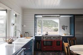 kitchen colorful cabinets wall lighting