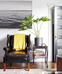 5 Designer Secrets To Make A Small Apartment Live Large Black Leather Chair Living Room Small Apartment Living Leather Chair Living Room